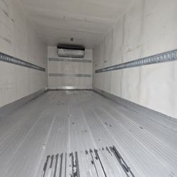 2021 Chevrolet LCF 4500XD refrigerated box truck with 112,373 miles. This medium-duty cab-over-engine (COE) truck is powered by a 5.2L 