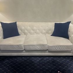 White Microfiber sofa, and two arm chairs