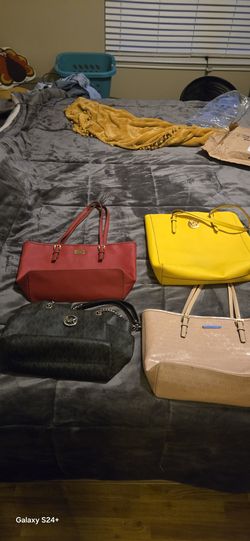 Set of 4 Michael Kors purses