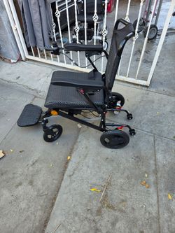 New Super Lightweight Foldable Electric Wheelchair. 350lb weight limit.  Weighs Only 42 lbs. 20 mile range Variable speed