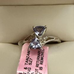 WHITE TOPAZ & TANZANITE TRILLION RING