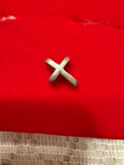 Sterling silver cross small but has weight