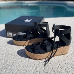 Black Sorel sandals 