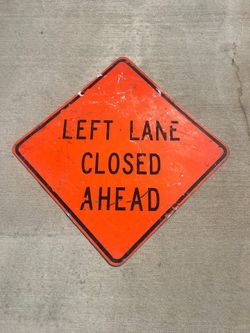 Left Lane Closed Sign