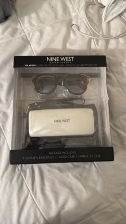 Super cute nine W. sunglasses polarized lenses. Package includes one pair of sunglasses one hard case and one wristlet case. Super cute gift.