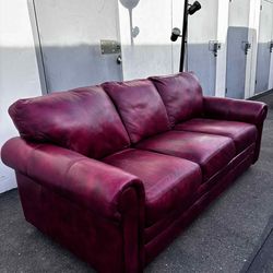 Red leather sofa