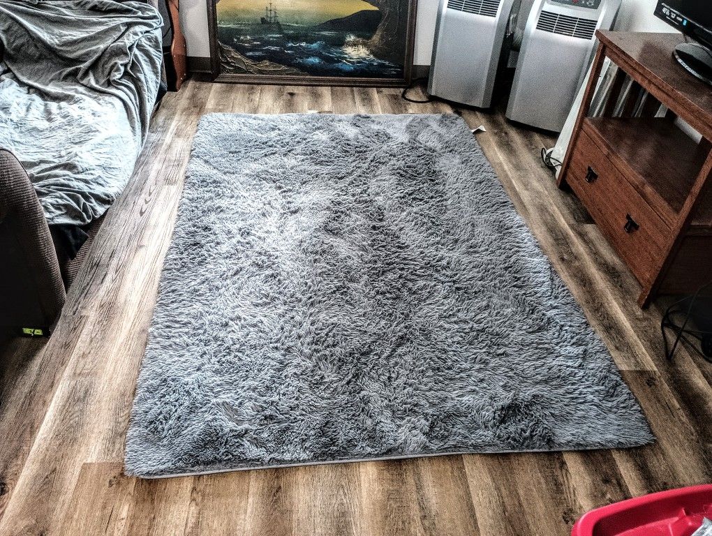 Area Rug. 7ft 10in X 5ft 1 inch. Soft, Clean. No smoke or pets. Thanks