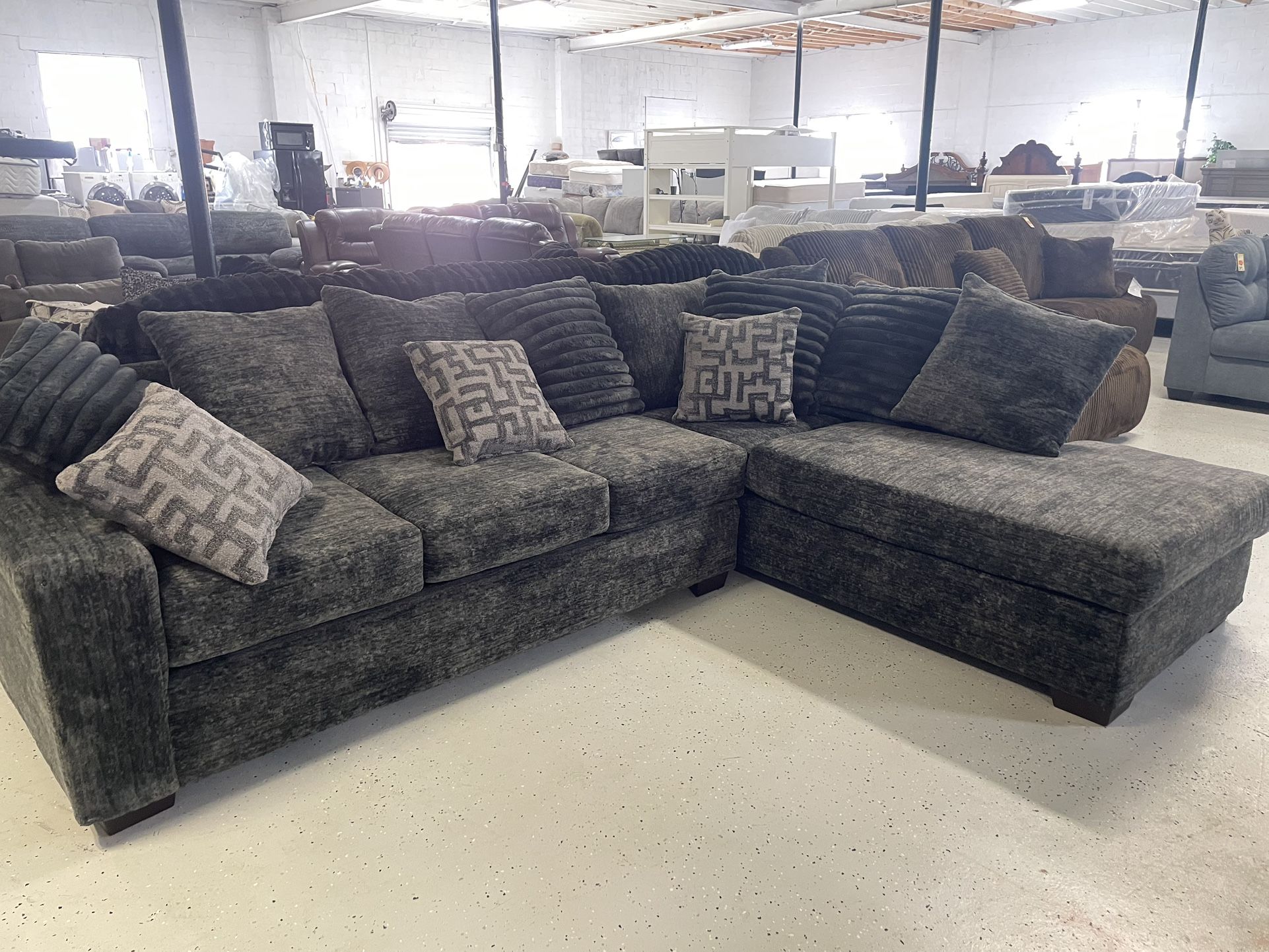 New sectional 118” by 88” $1299