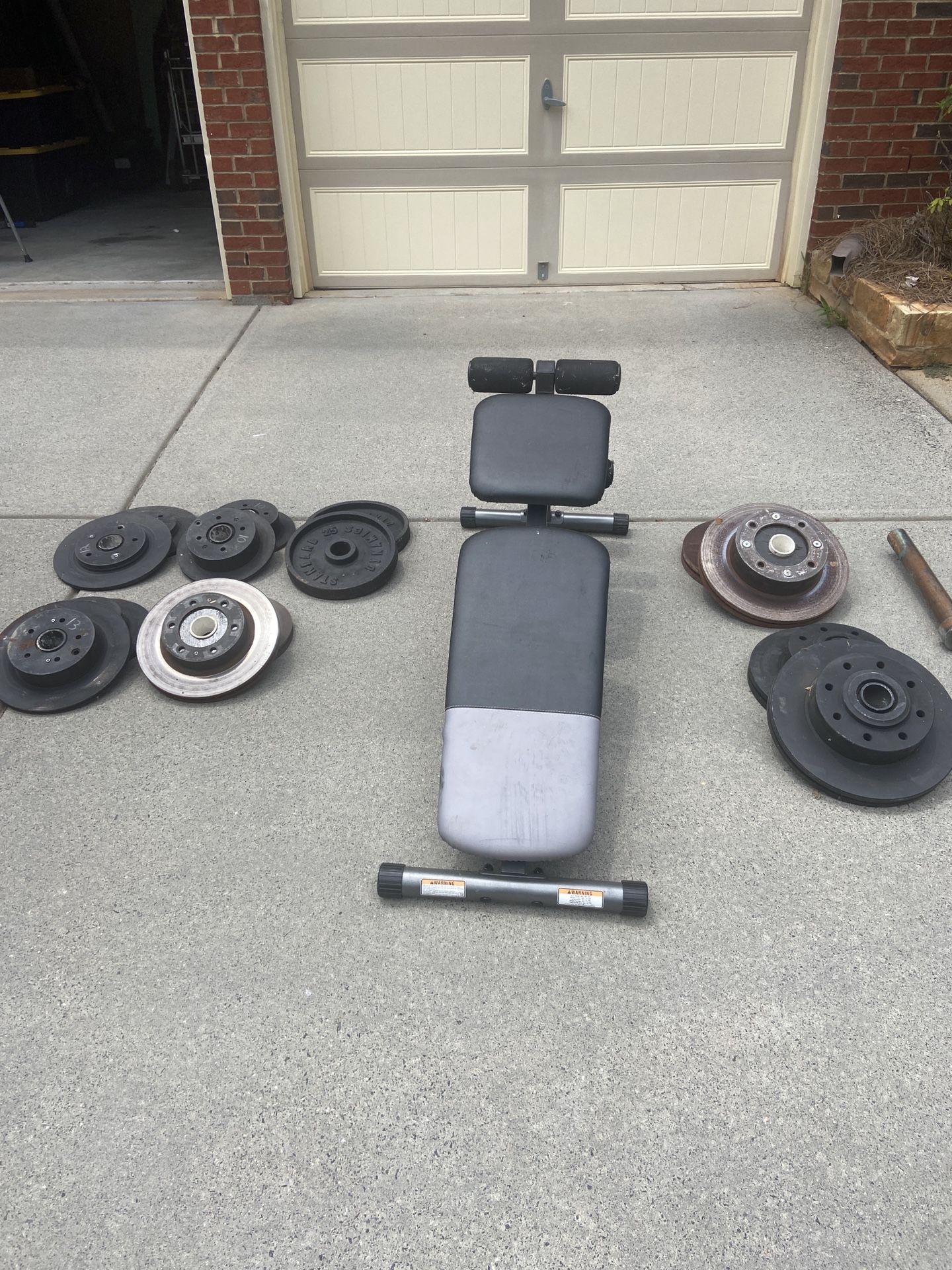 Adjustable Weight Bench, Olympic Bar and Cave Man Weights
