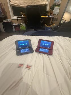 Two Nintendo 3DS XL Consoles with Games