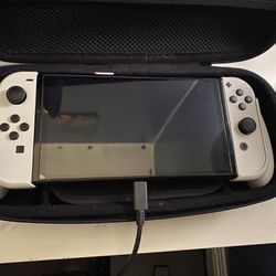 Like New Nintendo Switch OLED With Tempered Glass Screen Protector, Grip And Heavy Duty Case