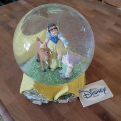 The Disney Store snow globe. 6"