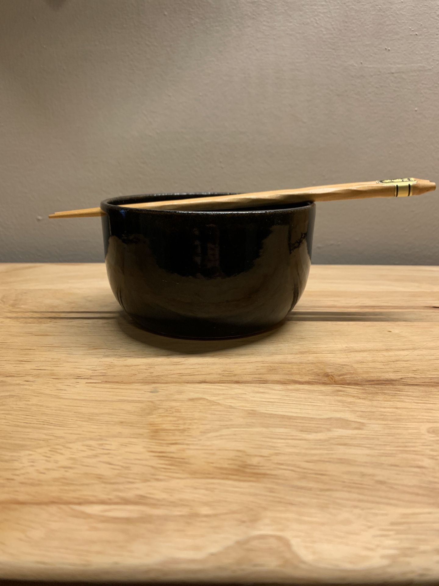 Ramen bowl with chopsticks