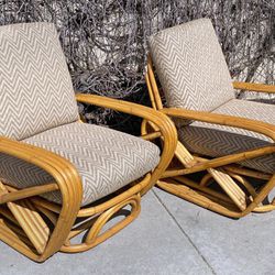 Vintage pair of 4 strand rattan pretzel lounge chairs