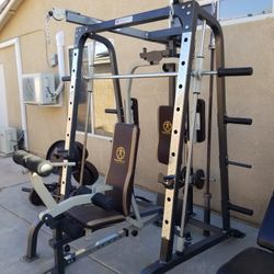 Marcy Diamond With 2- 45 Lbs   2 -35 Lbs   - 5 - 25 Lbs   2- 20 Dumbbell 8- 5 Lbs 2 - 10 Lbs Plas Extra Olimpic Bar 