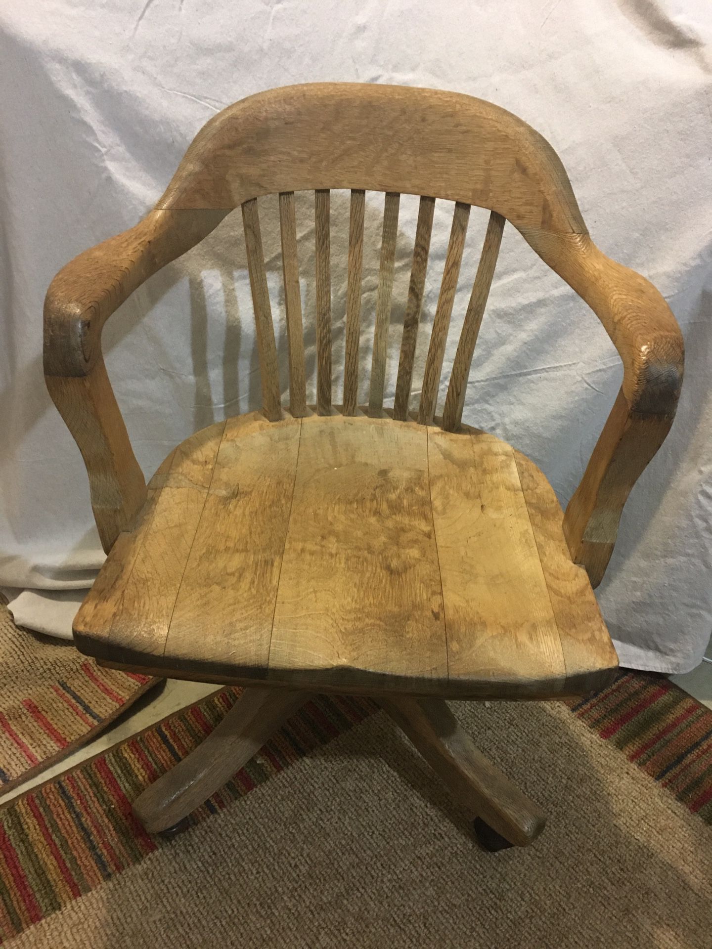 Antique oak swivel banker’s chair