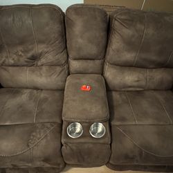 Bob’s Furniture Dual Power Couch, Brow Suede Lounge, USB Charging, Button Operation, Steel cup holders, durable storage bin.