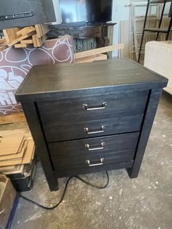 Black 4-drawer nightstand, metal pulls — $70 OBO