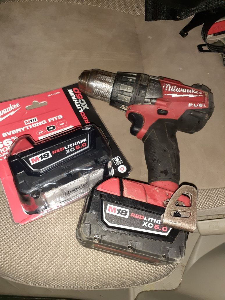Milwaukee fuel M18 Brushless drill with 2 new 5.0 batteries have box for other one