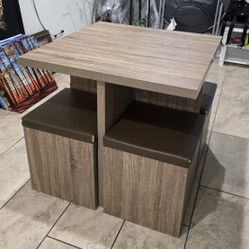 5pc Dining Set with Storage Ottomans and Faux Leather Seats
