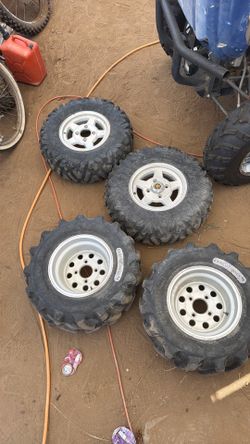Yamaha rhino 2 -25x10x12 and 2-25x8r12 tires and rims