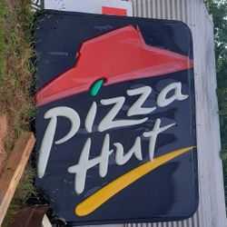 Huge PUZZA HUT sign 
