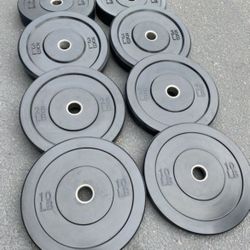 Brand New Set Of Commercial Grade Bumper Plates And Barbell
