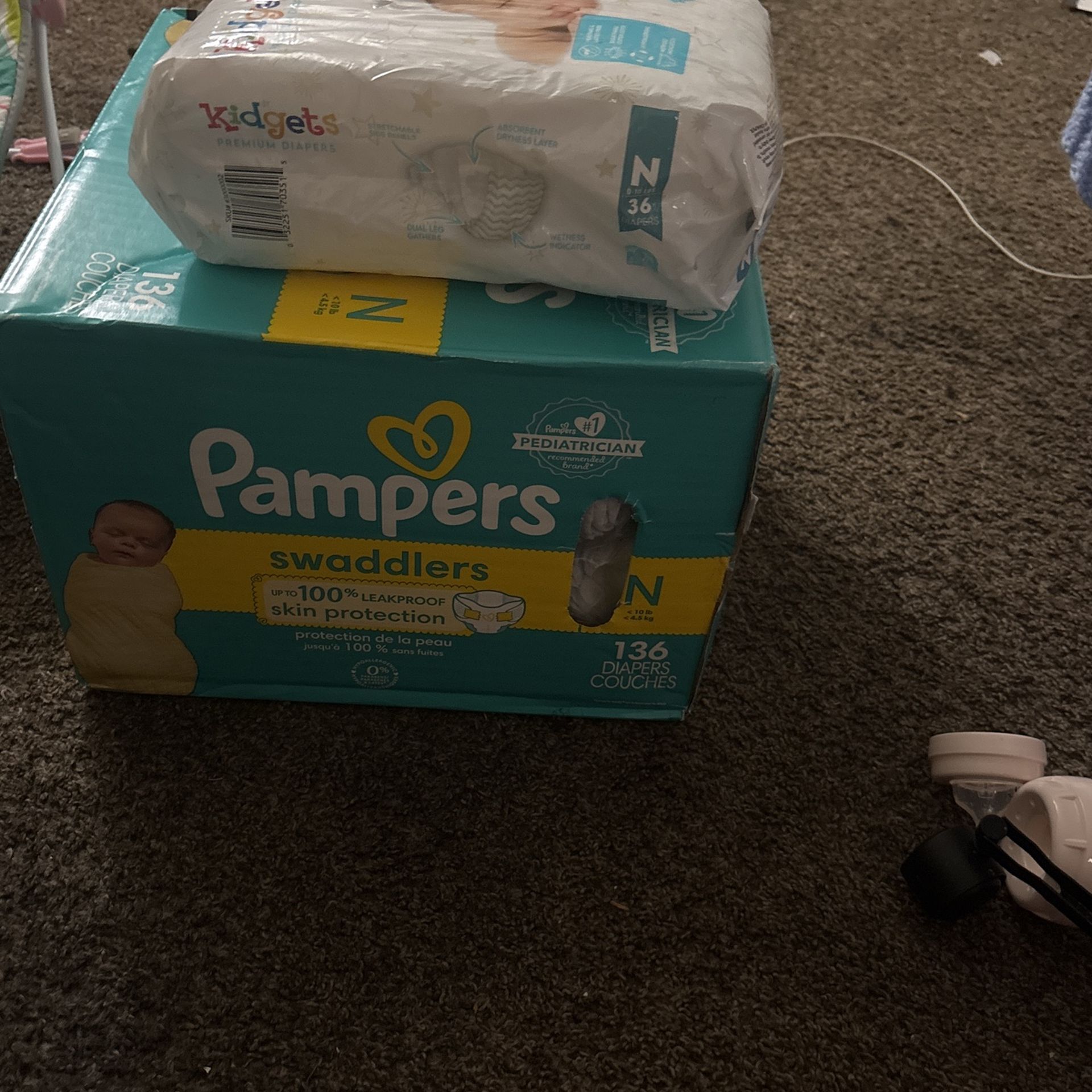 136 Newborn Dipers Extra Pack With 36