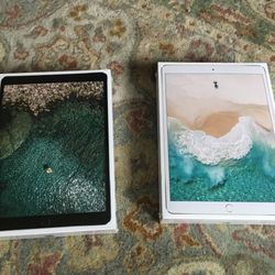 2 iPad pros 10.5 inch latest version second generation with the highest storage available 512 gb. WiFi. One in gold one in slate gray new sealed. N