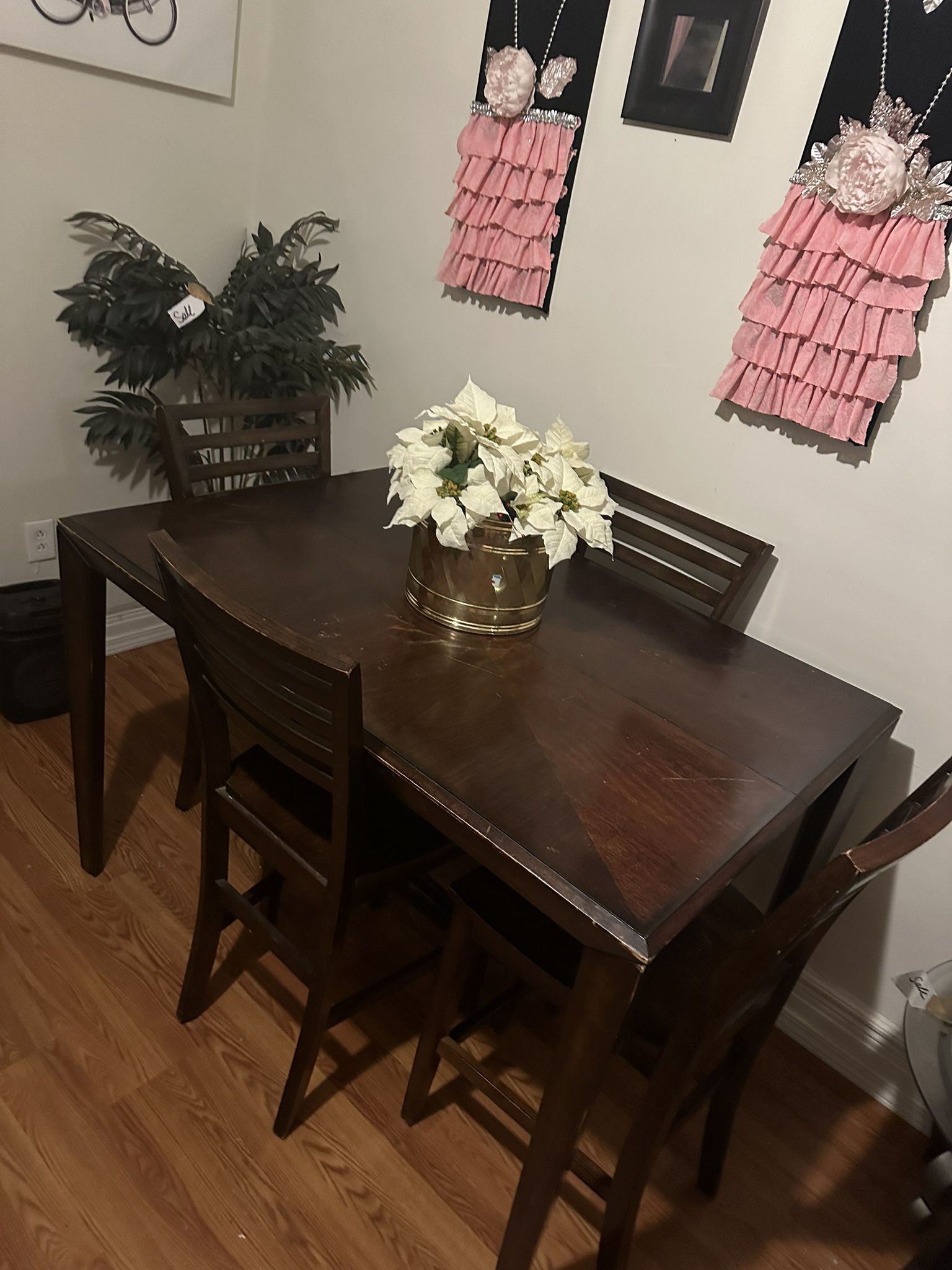 Dinette , the table length is 4'3" The width is 34 inches The height of the table is 2 1/2 feet.  