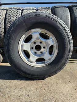 Single 16” 6 lug Chevy wheel and tire