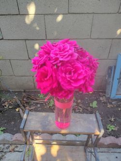 A dozen pink roses