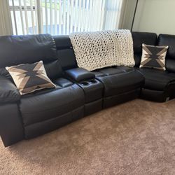 Black leather couch w/ 2 recliners 