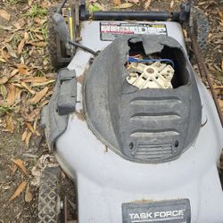 Free task force electric lawnmower. Part's. Was working but got rained on once last storm.