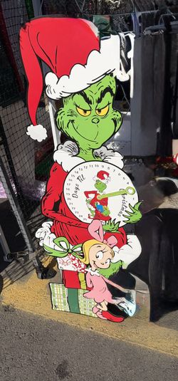 The Grinch Christmas countdown door sign.