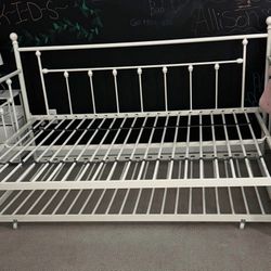 Full size White Metal Daybed with Twin Roll-Out Trundle Bed $250 (obo).