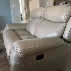 Haverty Recliner Power Sofa And Matching Gliding Rocker Love Seat