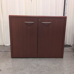Reddish Brown Two-Door Storage Cabinet with Silver Handles