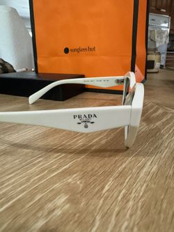 White Woman’s Prada Glasses