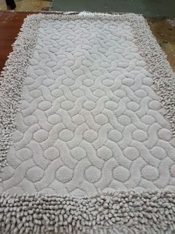 100% Natural organic Cotton. Good fit to bathroom and toilet.