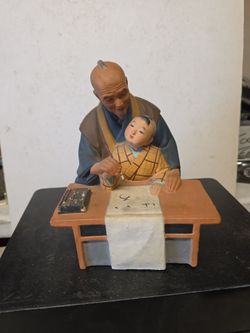 Japanese ceramic man and child