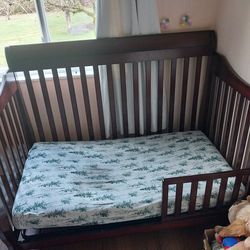 Dark Brown Crib with Toddler Rail and Mattress