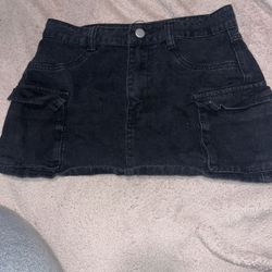 Black denim mini skirt