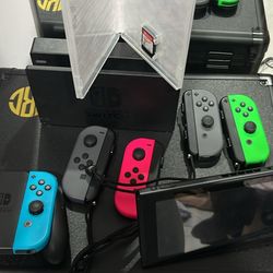 Switch W/ Extra Controllers And Game