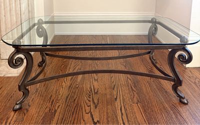 Metal and glass coffee table (46.5" w x 28.5" d x 16.5" h)