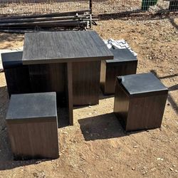 Table with storage chairs