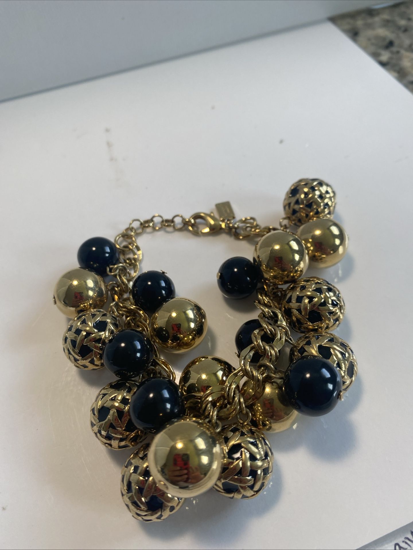 Kate Spade New York Gold Tone Chaim Bracelet With Black And Gold Beads