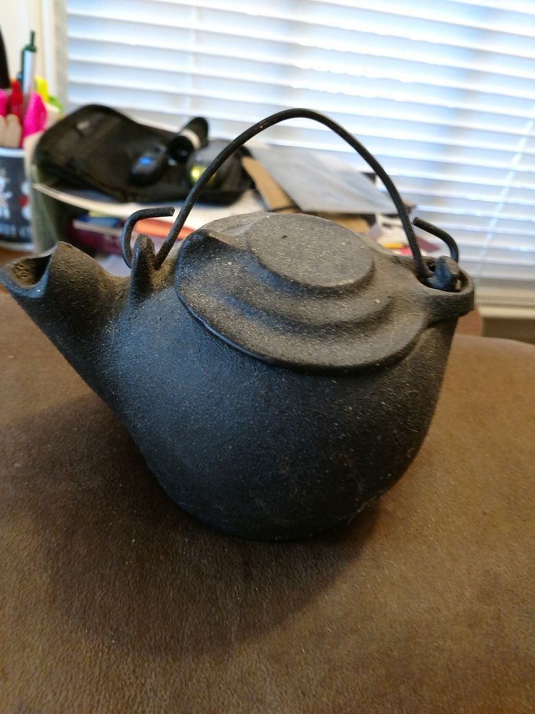 Antique small kettle. Miniture