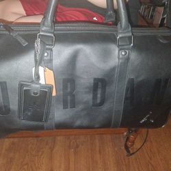 Michael Jorden Lether Monagram Bag  Never Used Brand New