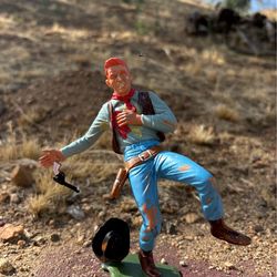 Vintage Marx wounded cowboy